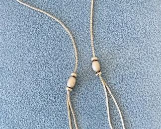 $620 - 14K station necklace with barrel safety clasp; stamped 585 Italy; 17”  long