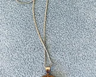 $650 - 1975 Vasco Nunez de Balboa (Panama)  gold coin in 14K bezel on  20” 14K gold chain; 