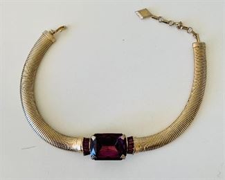 $30 - Vintage goldtone flex collar/choker necklace with faux amethyst bauble; adjustable