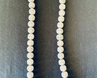 $20 - Vintage Monet white filigree necklace; 24” long