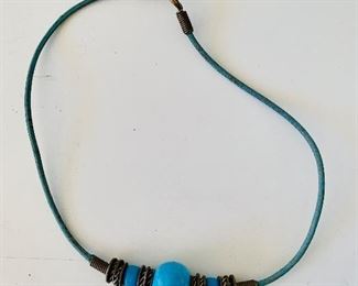 $20 - Vintage tribal necklace with blue and silvertone beads on rope;  approx 15”