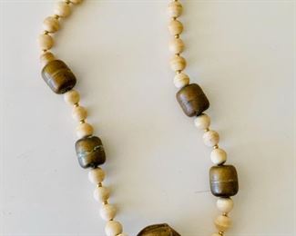 $20 - Vintage beaded station necklace with brass bead accents; 20” long