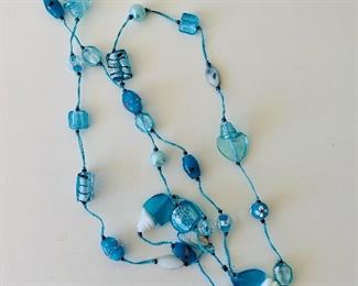 $20 - Blue artglass necklace; 54” long