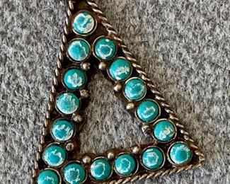 $50 - 18” sterling silver necklace with silver and turquoise triangle pendant; 1” pendant; stamped TAXCO TCC 925 on reverse