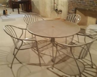 Quality  Woodard patio table umbrella 
Chairs with cushions
Like new