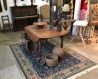 Primitive baskets and table. 