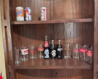 Collectible Coca Cola bottles and barware 