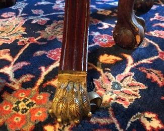 Dining room table brass claw foot