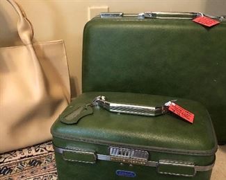 Vintage green American Tourister train case and matching suitcase