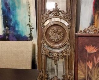 Uttermost carved mirror