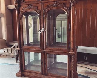 Cherry wood carved glass curio cabinet