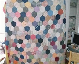 Colorful hand made quilt.