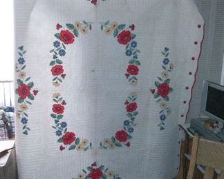 Beautiful hand stitched applique quilt.