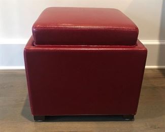 RED STORAGE OTTOMAN.  PADDED TOP.                    
17 3/4" X 17 3/4 X 16 1/2"                                                             