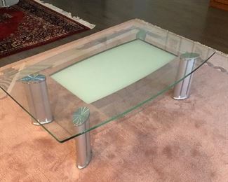 GLASS TOP COCKTAIL/COFFEE TABLE                55.25" X 31.5" X 15.25"                                              
EXCELLENT CONDITION                                                     