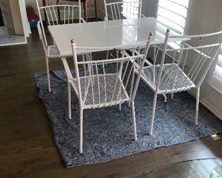 METAL OUTDOOR TABLE & 4 CHAIRS.                             
47.25" X 29.5"                                                                            
GOOD CONDITION.                                                                   
