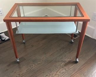 TV CART/STAND                                                                                     
CALLIGARIS ITALIAN NATURAL CHERRY                          
VERY GOOD CONDITION                                                  
33.5" X 18.5"X25.75"                                  
