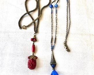 $35 each Art Deco style necklaces.   Red: chain: 15.5"L;  pendant: 2.5"L.  Blue:  chain: 20.5"L.  pendant: 2.5"L
