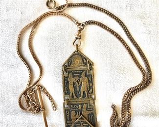 $40 Egyptian revival pendant on mismatched chain.  Chain: 28"L.  Pendant: 4"L.  Extension chain: 24"L