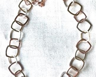 $24  Gold tone, silver tone and copper tone adjustable necklace.  21"L
