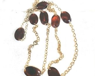$20 Extra long faux tortoise shell gold tone necklace.  54"L