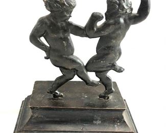 $75 Art Deco two metal figures on wood stand 6"H by 5 and 1/2" wide 