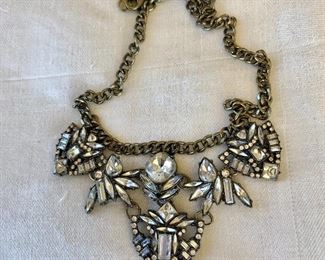 $22 Art deco style bib shaped necklace.  20"L.  Pendant: 3"L 