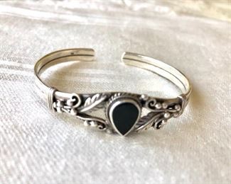 $30 Sterling cuff bangle with onyx stone.  2.5"D 