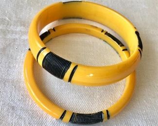 $50 Pair amber color ribbed bakelite bangle bracelets. 2.5"D each