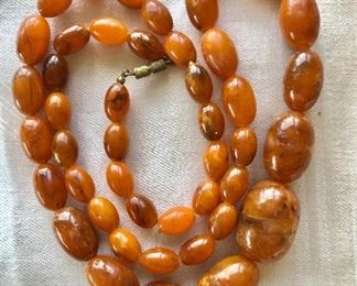 $38 Large strand amber color and marbled beaded necklace.  31.5"L