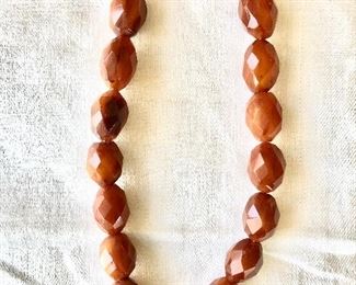 $75 Faceted bakelite  butterscotch amber necklace.  16.5"L