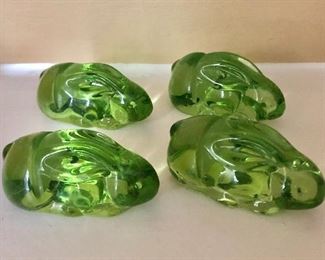 $40 Set of 4 green glass rabbits. Each 2.5" L, 1.25" H. 