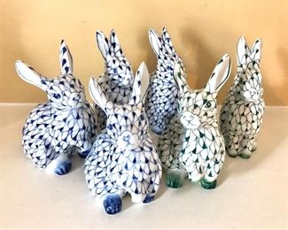 $75  - Set of 4 blue and 2 green "Andrea" porcelain rabbits. Each 6" H, 5" W, 4" D. Stamped "Handpainted" 