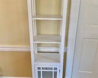 $60 - Tall shelving unit with cabinet.  62" H, 18" W, 11" D.