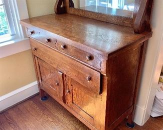 $350 - Vintage oak chest with mirror and casters.  52" H, 42" W, 20.5" D.  
