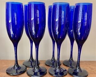 $50 7 Cobalt blue champagne glasses.  8.75" H, 2" diam. 