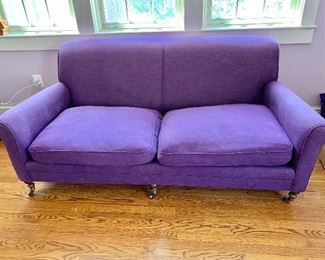 $295 - Two cushion purple sofa on casters - 32" H, 75" W, 33.5" D, seat height 17.5" - AS IS - minor wear on left side of sofa