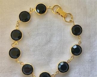 $14 Black stone bracelet with goldtone clasp.  8"L 