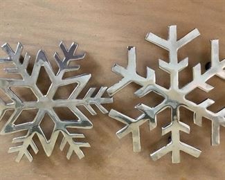 $20 each Snowflake trivets.  Each  7" diam.