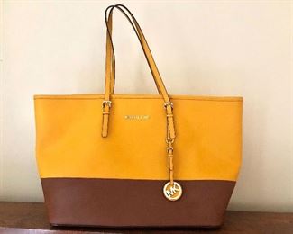 $95 Michael Kors yellow brown purse.   11" H, 19.5" W, 6" D, 8" handle drop.