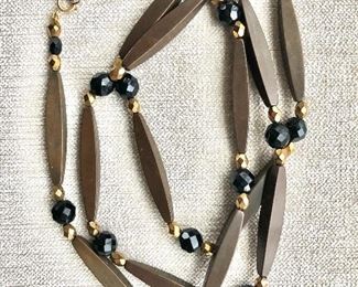 $30 Vintage early plastic deco necklace 33" Long 