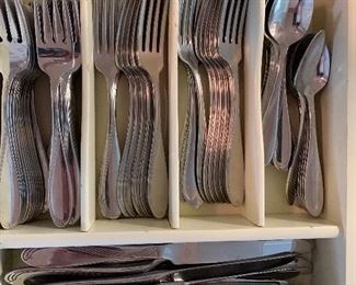 $75 Oneida flatware set (box not included). Set includes 27 dinner forks, 33 salad forks, 28 teaspoons, 18 knives. 