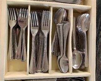 $75 Walco flatware set (box not included). Set includes 27 dinner forks, 24 salad forks, 27 teaspoons, 27 soup spoons, 62 round soup spoons, 26 knives. 