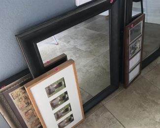 Variety of art pieces, frames, mirrors