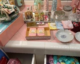 Perfume bottles, mirrored tray, vanity items