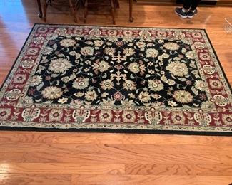 #24	Black/Burgandy Tan Machine Made Rug  61x88	 $30.00 
