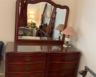 #52	The Continental furniture Dresser w/8 drawers Curved Front w/Mirror 55Wx22Dx35T   Mirror 45x37	 $275.00 
