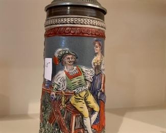 #97	9" Metal Lidded Beer Stein w/lady & man on front	 $20.00 
