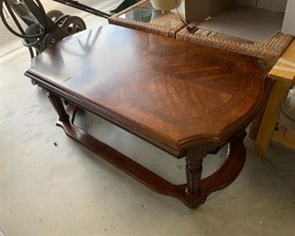 #137	Coffee Table w/inlaid flowers on top  48wx25.5Dx20t	 $75.00 
