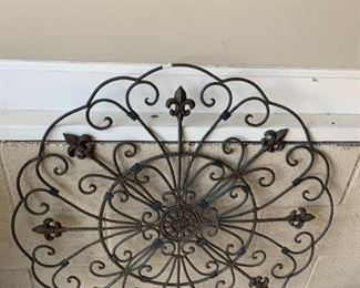 #140	Wrought iron Artwork Piece  31Round	 $35.00 
